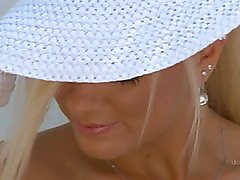 Blonde in white hat masturbating