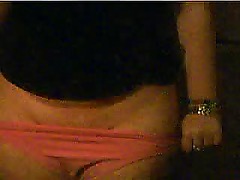 Teen plays with tampon in front of the webcam