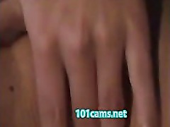 Shows her pussy and rubs it -