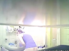 Mum Sandra washing pussy in the bathroom