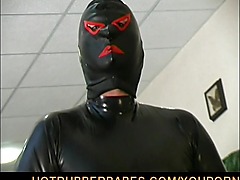 Glamour couple in tight latex