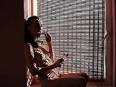 Si(y)lvia Smoker. Sitting in the window or Marlboro 100s red. Fetish Art.I