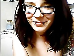 Goth girl teasing in bathroom.