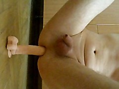 Jumping on a dildo and masturbation