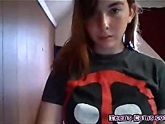 Sexy redheaded teen schoolgirl teases on webcam