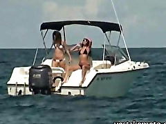 Two naughty amateur girls horny threesome on a speed boat