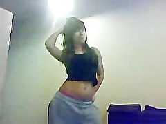 Awesome Brunette dancing & stripping