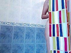 big tits teen uses showerhead on her pussy