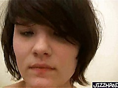 Cute brunette handles cock for fist time