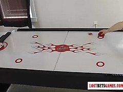 Strip Air Hockey game gets rambunctious