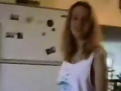 Amateur masturbates in kitchen