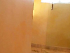 Girl unaware shes filmed while showering but is horny when she sees it