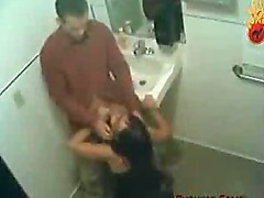 Public bathroom blowjob caught on tape