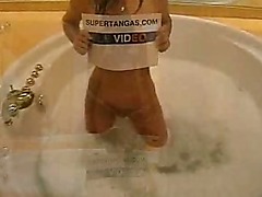 Gorgeous tight babe playing in the bath
