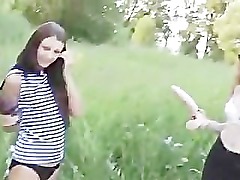 Teens sword fight with dildos