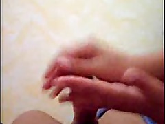 She jerks him and gets cum all over her hands