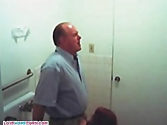 Older guy getting blowjob by teen girl on toilet