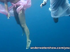 3 girls stripping in the sea